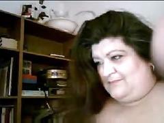 mature brunette lady masturbating on webcam